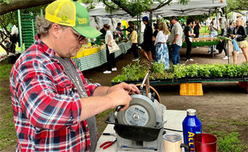 Knife sharpening happening at American Pride Microfarm